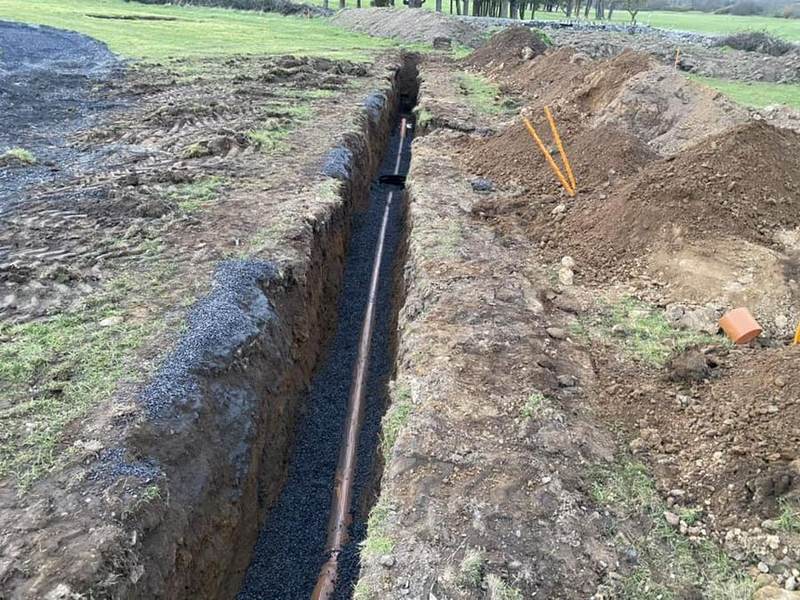 Drainage trench with GS Services machinery and pipework
