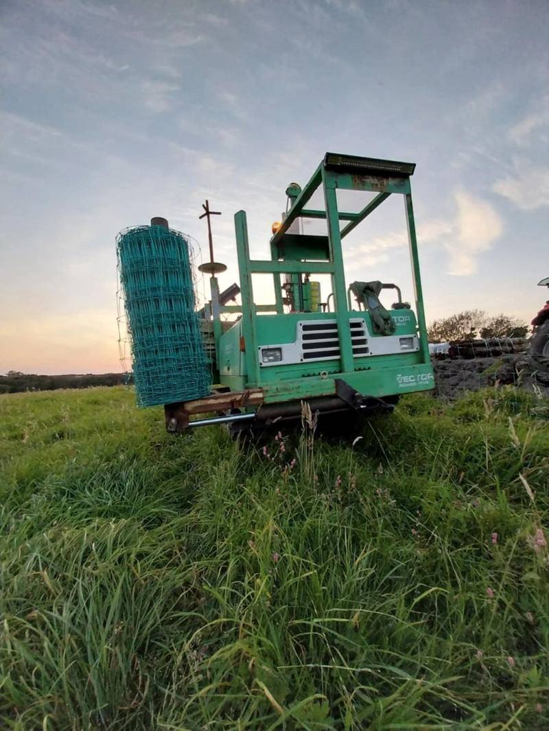 Fencing machine and post knocker on agricultural ground